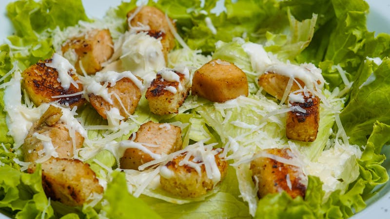 Fresh Caesar salad with croutons and Parmesan